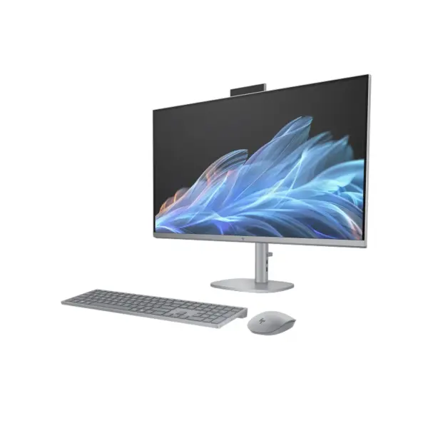 Right perspective view of HP OmniStudio X 32 AIO Desktop PC on a black background, featuring the 31.5-inch 4K UHD display with matching silver wireless accessories.